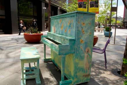 Photo of an outdoor piano.